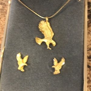 Gold look eagle pendant and matching earrings